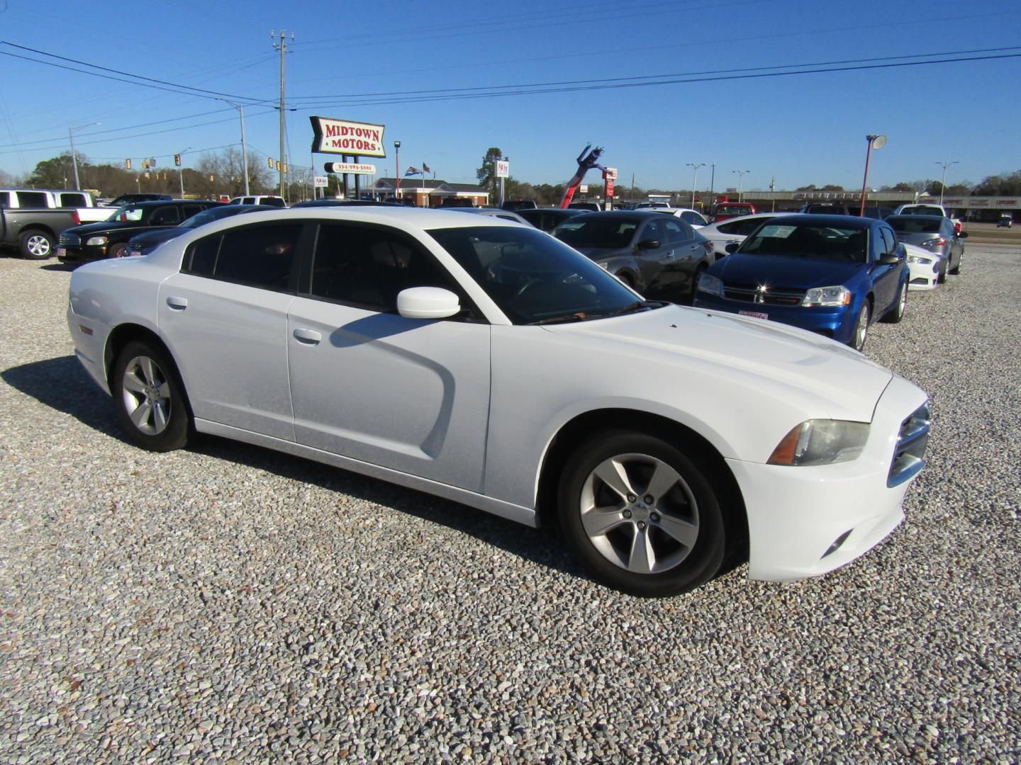 2014 White Dodge Charger SE (2C3CDXBG5EH) with an 3.6L V6 DOHC 24V engine, Automatic transmission, located at 15016 S Hwy 231, Midland City, AL, 36350, (334) 983-3001, 31.306210, -85.495277 - Photo#0